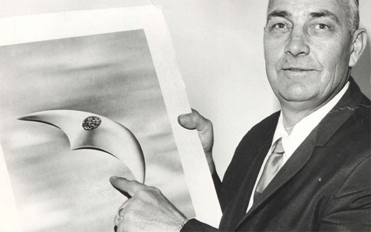 Kenneth Arnold with drawing of the flying wing UFOs he saw