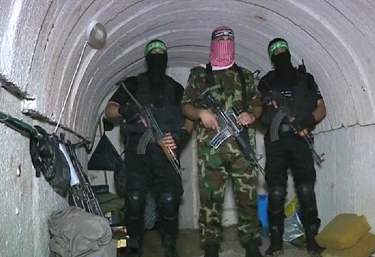 Hamas resistance fighters in a tunnel under Gaza